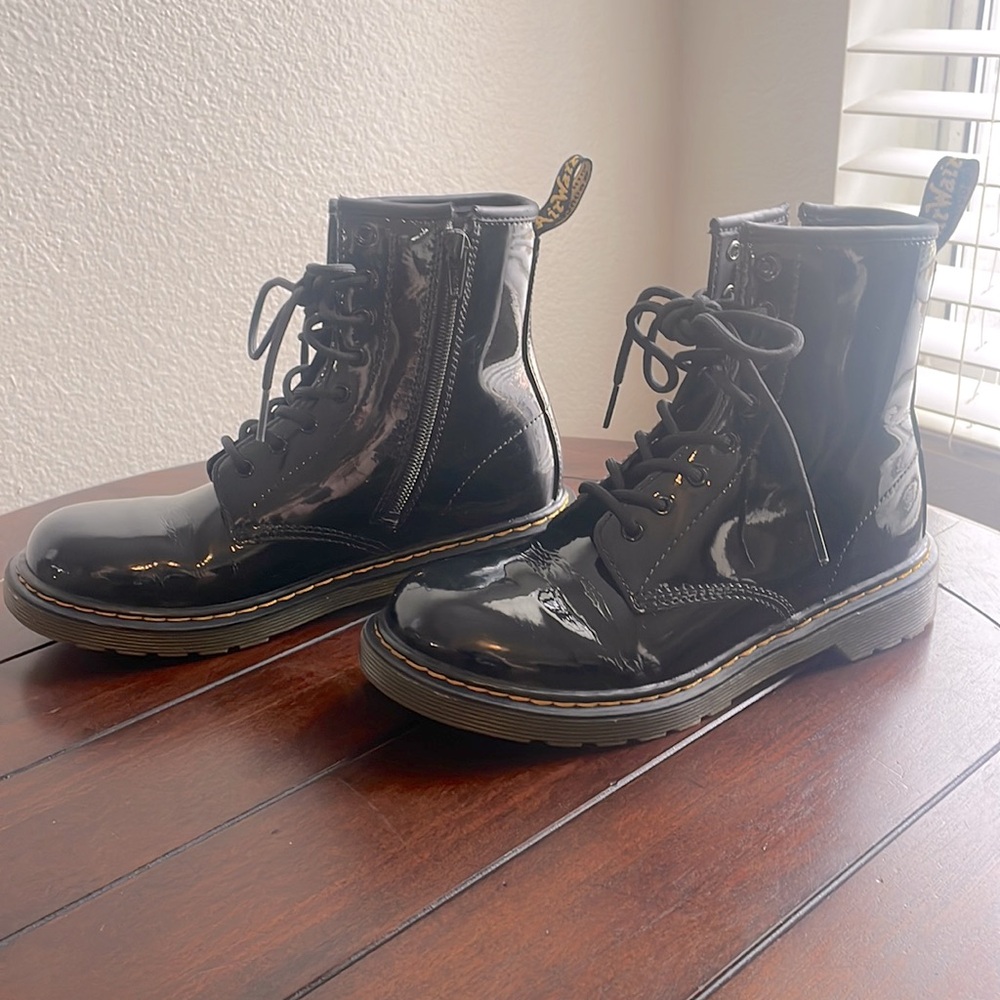 Women’s Dr. Marten’s patent boots.